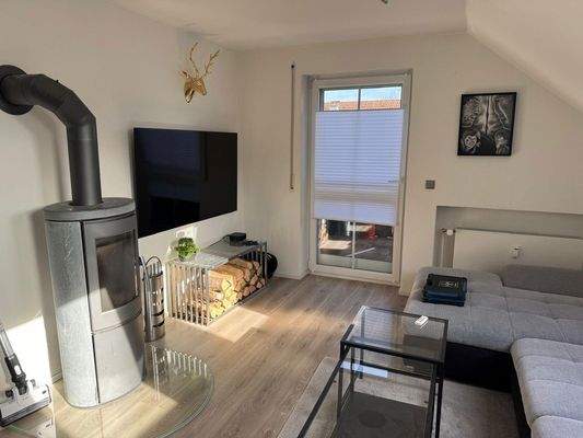 Wohnzimmer mit Kamin