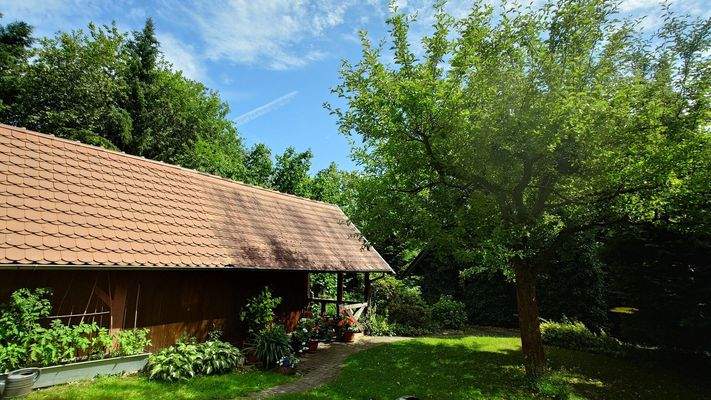 Nebenhaus mit Sitzecke und Lagerfläche