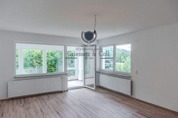 Wohnzimmer mit Wintergarten