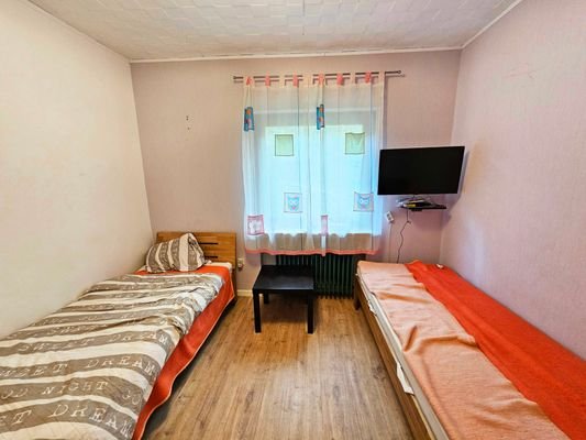 Schlafzimmer III OG