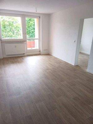 Wohnzimmer mit Balkon