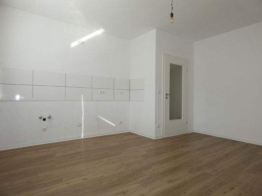 Beispielfoto Wohnzimmer mit Küchenzeile