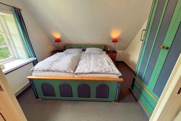 W1: Ein Schlafzimmer im Obergeschoss