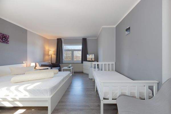 Das moderne Doppelzimmer mit 3 Schlafgelegenheiten