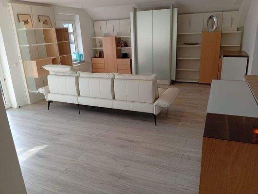 Wohnzimmer im OG mit Wohnwand 