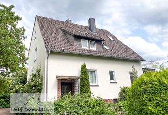 Massives Dreifamilienhaus