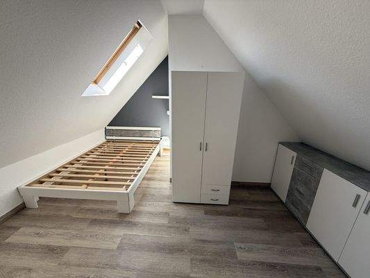 weiteres Zimmer im Dachgeschoss