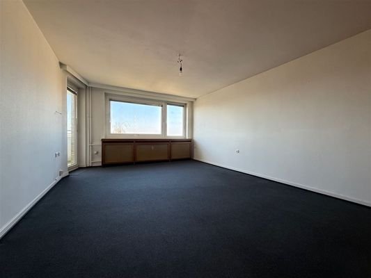 Wohnzimmer mit Balkon