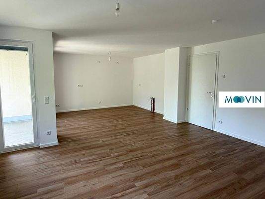 Ansicht II: Wohn- und Esszimmer mit offenem Küchenbereich