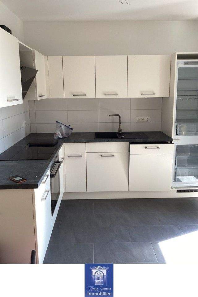 Eindrucksvolle und moderne Neubauwohnung mit Balkon & EBK! Lift! - Foto 1