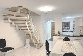 Haupthaus Wohnen mit Blick in die offene Küche und Eingangsbereich