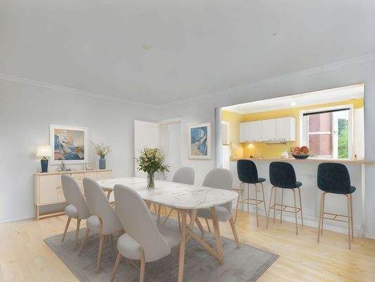 Wohnzimmer/Esszimmer mit offener Küche virtuell gestaged  Kiel - Niemannsweg - Lütt Immobilien