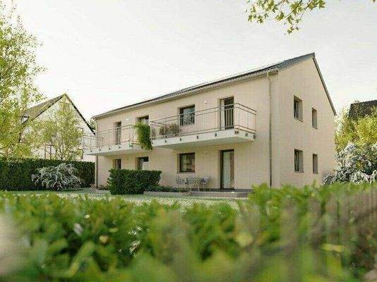 4-Familienhaus Gartenansicht.jpg