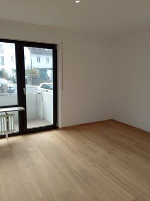 Wohnzimmer mit Balkon