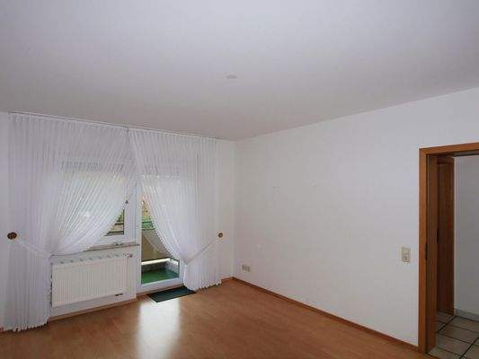 Schlafzimmer mit Balkontüre