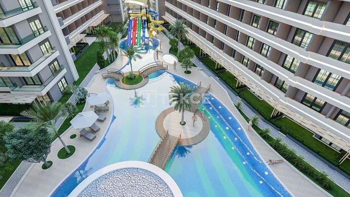 Properties in Complex with Pool Near the Sea in Tömük Mersin