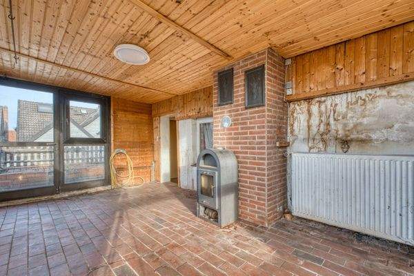 Wintergarten mit Kamin OG