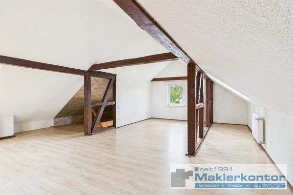 Dachgeschoss/Wohnbereich mit Kamin