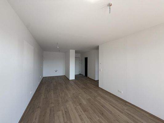 Haus_1_Top_15_Wohnbereich_mit_Blick_auf_die_Küche