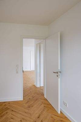 Schlafzimmer 3 - Blick Flur und Küche