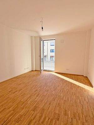 Schlafzimmer mit Balkonzugang