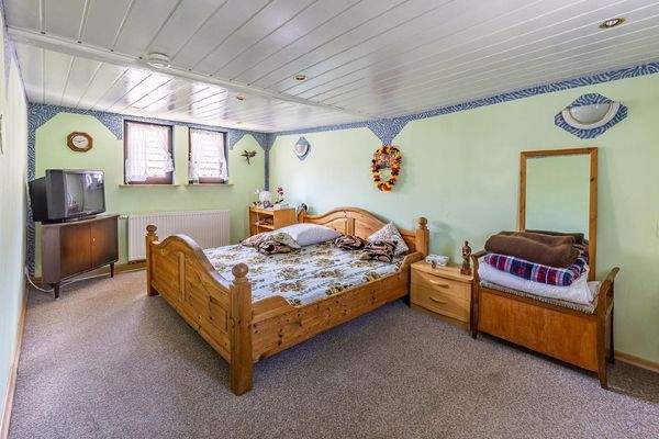 Haus 1 OG Schlafzimmer 1