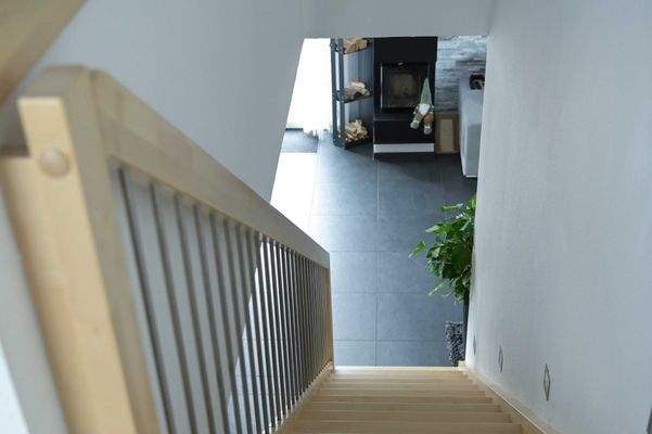 Architektonisch durchdacht – offener Treppenlauf mit Sichtachse auf das Herzstück des Wohnens
